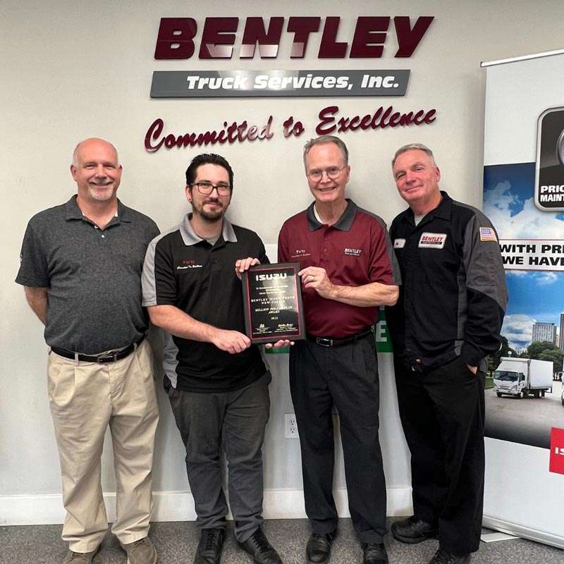 Bentley Truck Services Employee's with award